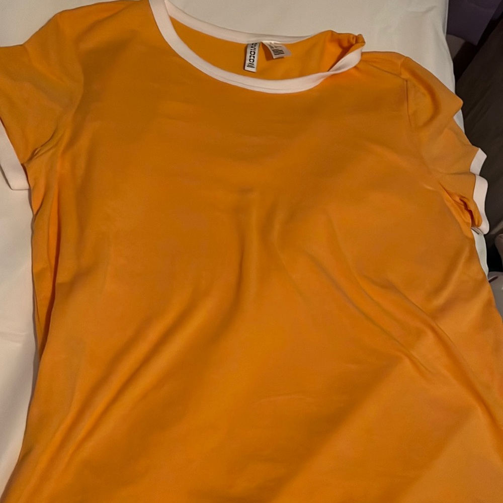Divided H&M yellow top. No hole and smoke free home
